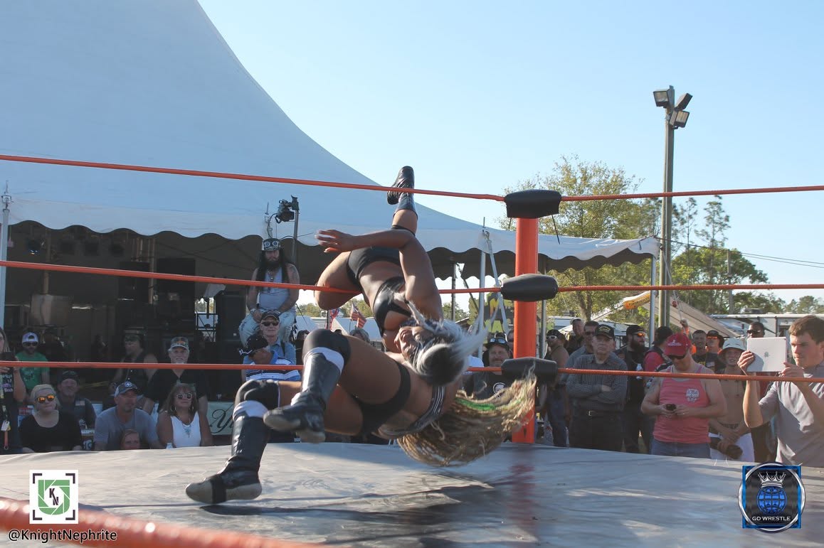 Lacey picks up the win on the corkscrew neckbreaker! — with Lacey Lane at Cacklebery Campground.