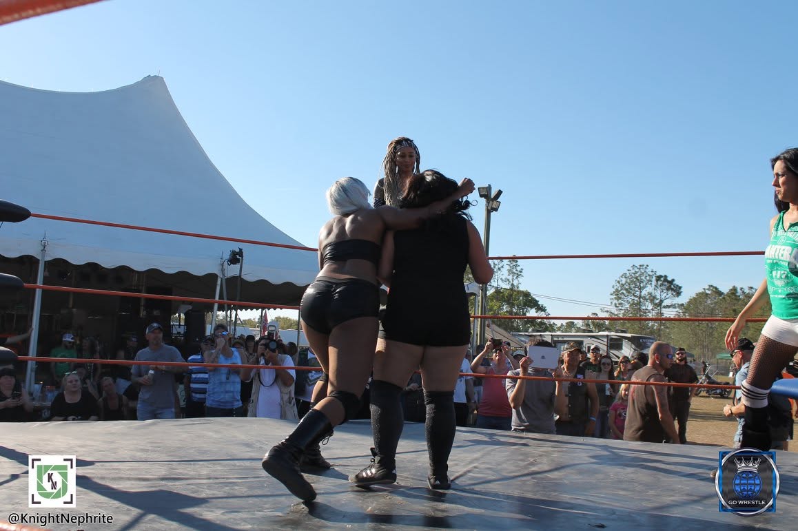 Triple Threat Match - Lacey Lane vs. Black Diamond vs. Lexii Gomez (who was eliminated off this clothlesline from behind) — with Lexii Gomez and Lacey Lane at Cacklebery Campground. 1